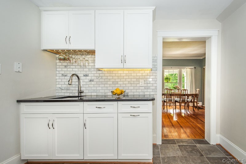 8088 Nelson Ridge Drive Hanover, VA 23069 - Photo 24 of 50 a kitchen with white cabinets and sink