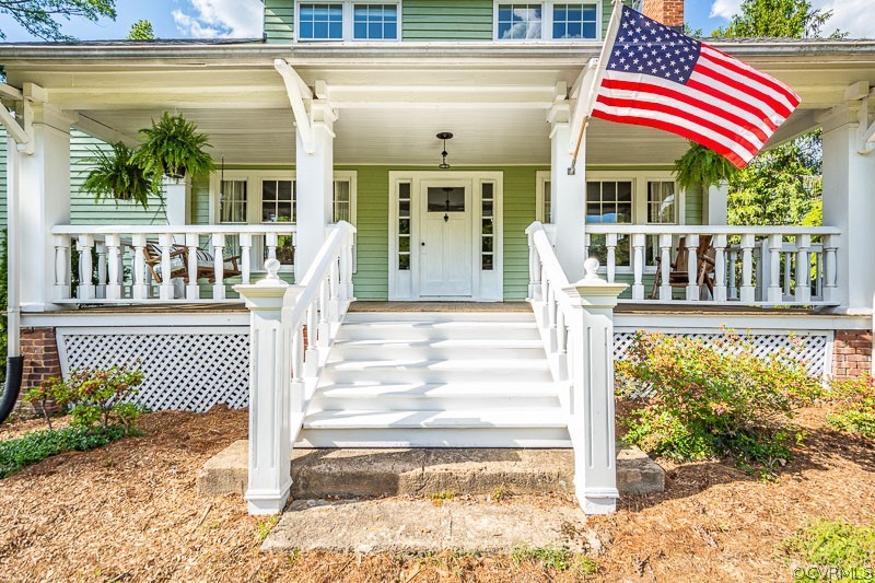 8088 Nelson Ridge Drive Hanover, VA 23069 - Photo 3 of 50 a front view of a house with a porch