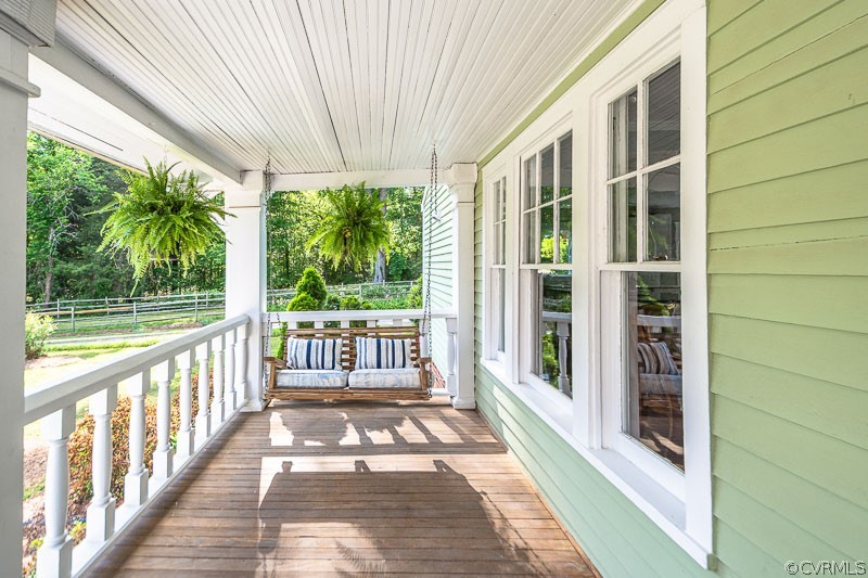8088 Nelson Ridge Drive Hanover, VA 23069 - Photo 4 of 50 a view of a balcony with wooden floor