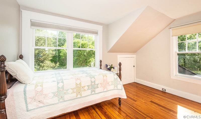 8088 Nelson Ridge Drive Hanover, VA 23069 - Photo 41 of 50 a bed sitting in a bedroom next to a window
