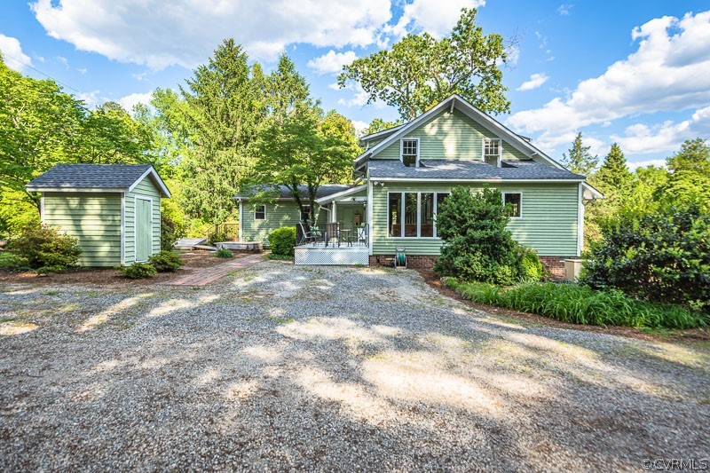 8088 Nelson Ridge Drive Hanover, VA 23069 - Photo 45 of 50 a front view of a house with a garden