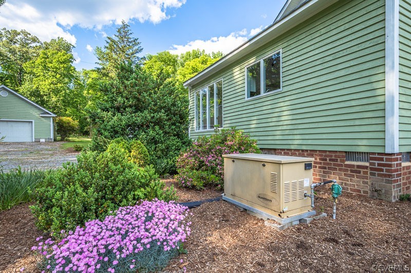 8088 Nelson Ridge Drive Hanover, VA 23069 - Photo 46 of 50 a view of a house with a yard