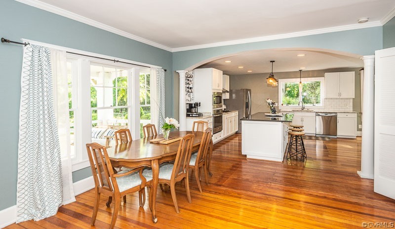 8088 Nelson Ridge Drive Hanover, VA 23069 - Photo 9 of 50 a view of a dining room with furniture window and wooden floor