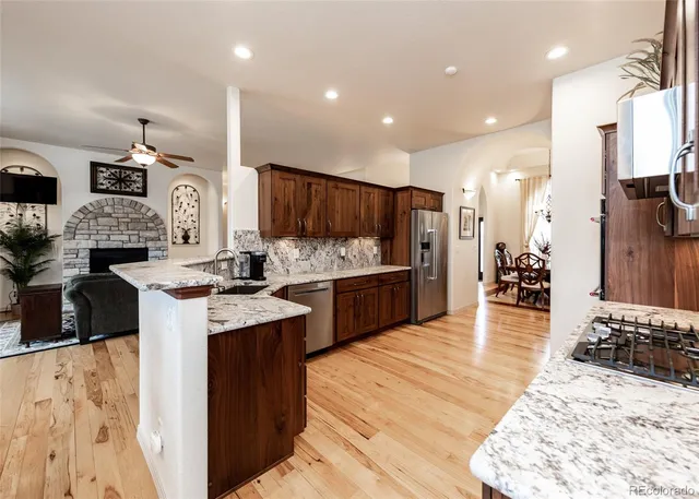 a kitchen with lots of counter top space and appliances