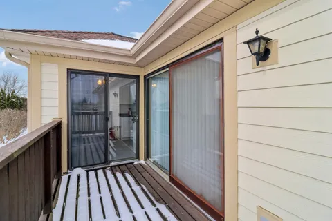 a front view of a house with garage