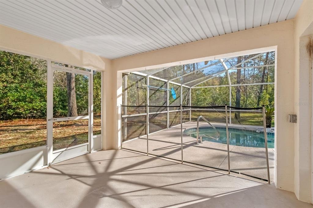 10795 Southwest 53rd Circle Ocala, FL 34476 - Photo 36 of 47 a view of a room with a glass door