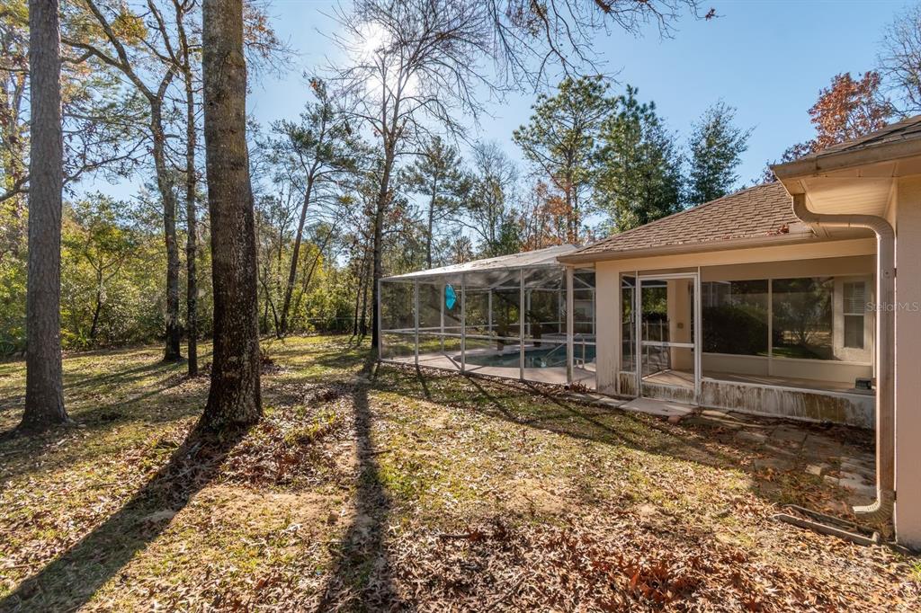 10795 Southwest 53rd Circle Ocala, FL 34476 - Photo 42 of 47 a backyard of a house with outdoor seating