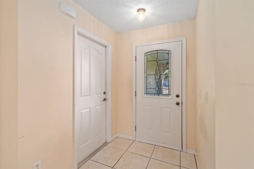 10795 Southwest 53rd Circle Ocala, FL 34476 - Photo 9 of 47 a view of an entryway door