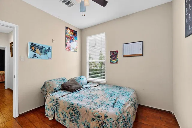 a view of a house with backyard porch and sitting area