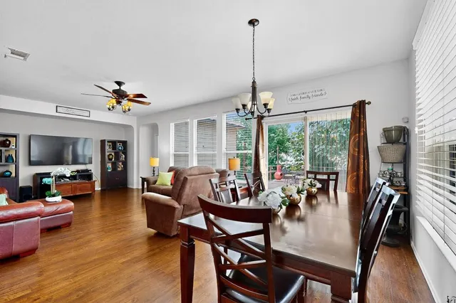 a kitchen with stainless steel appliances granite countertop a refrigerator sink and cabinets