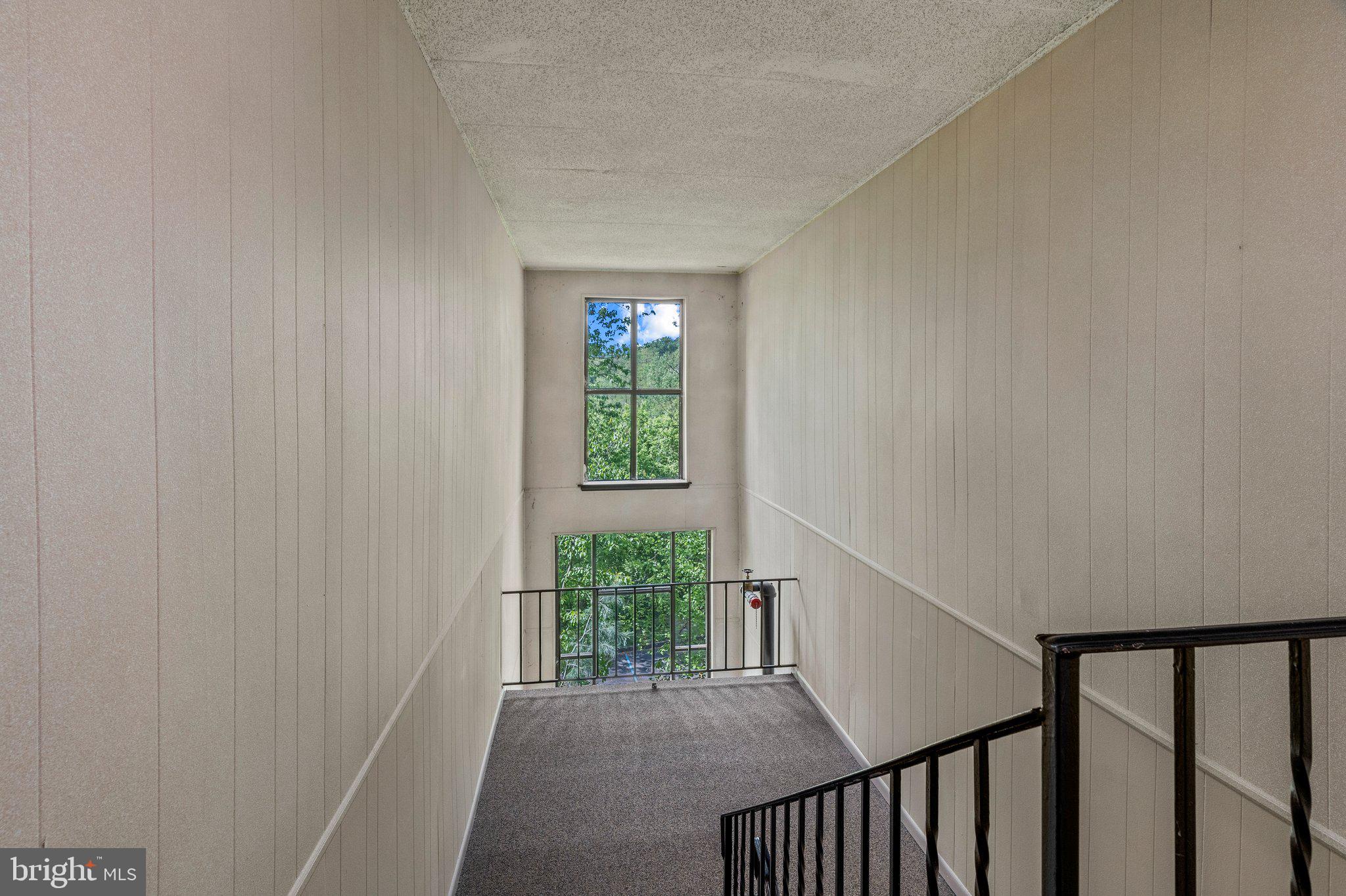 a view of entryway with stairs
