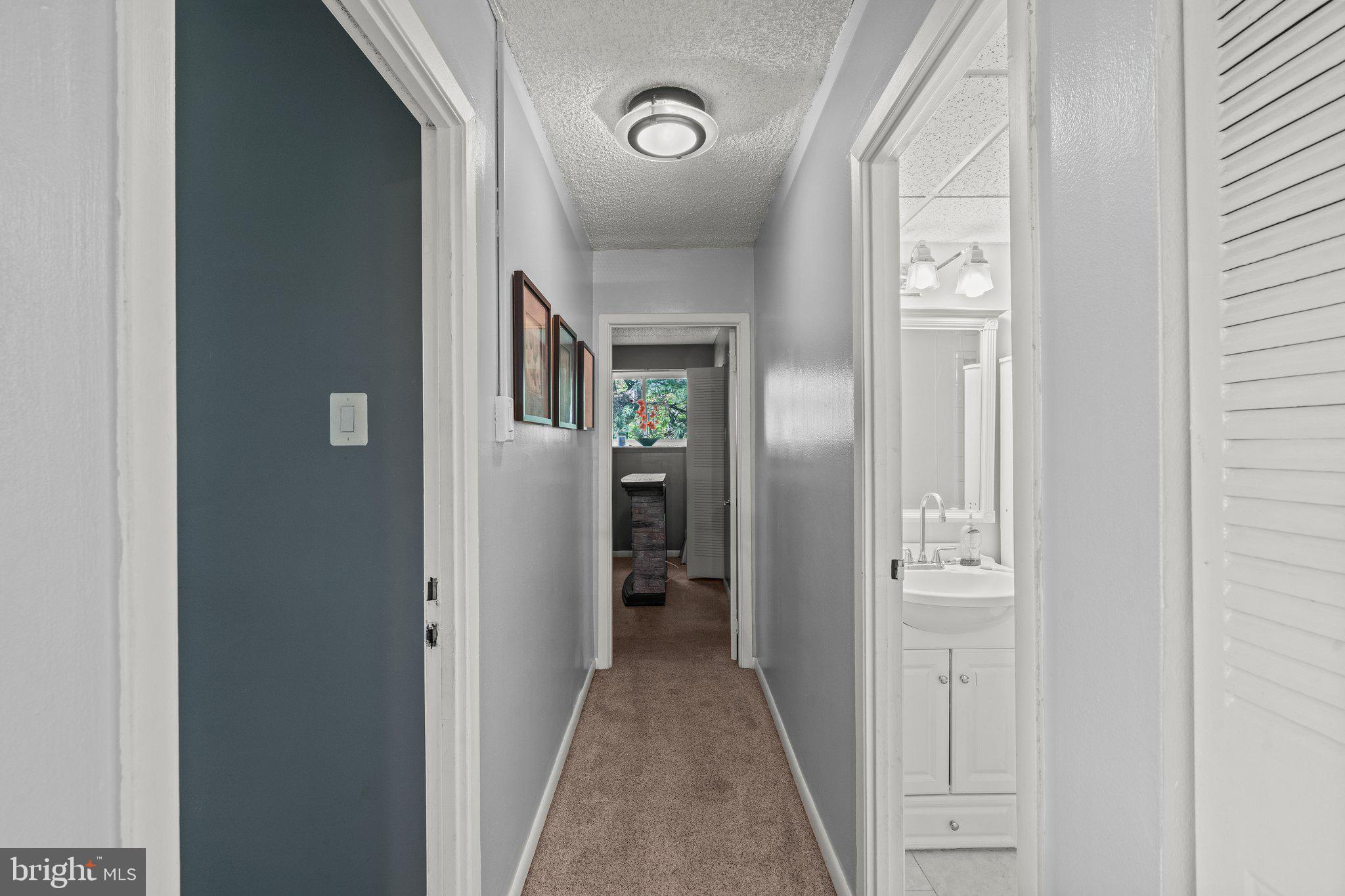 400 Glendale Road, Unit D51 Havertown, PA 19083 - Photo 10 of 17 a view of a hallway with closet and a mirror