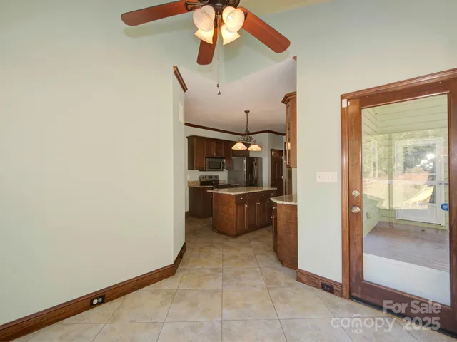 a kitchen with stainless steel appliances a refrigerator and a sink