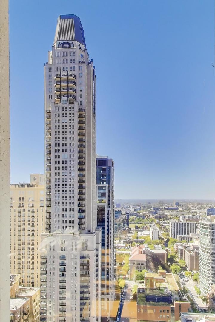 100 East Walton Street, Unit 42F Chicago, IL 60611 - Photo 11 of 50 a view of a city with tall buildings