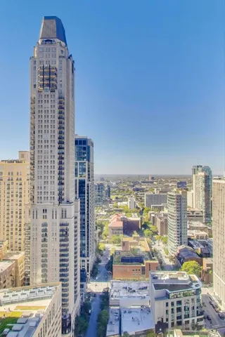 a view of a living room and kitchen