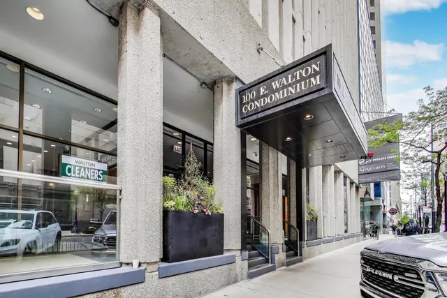 a view of a street with sitting area