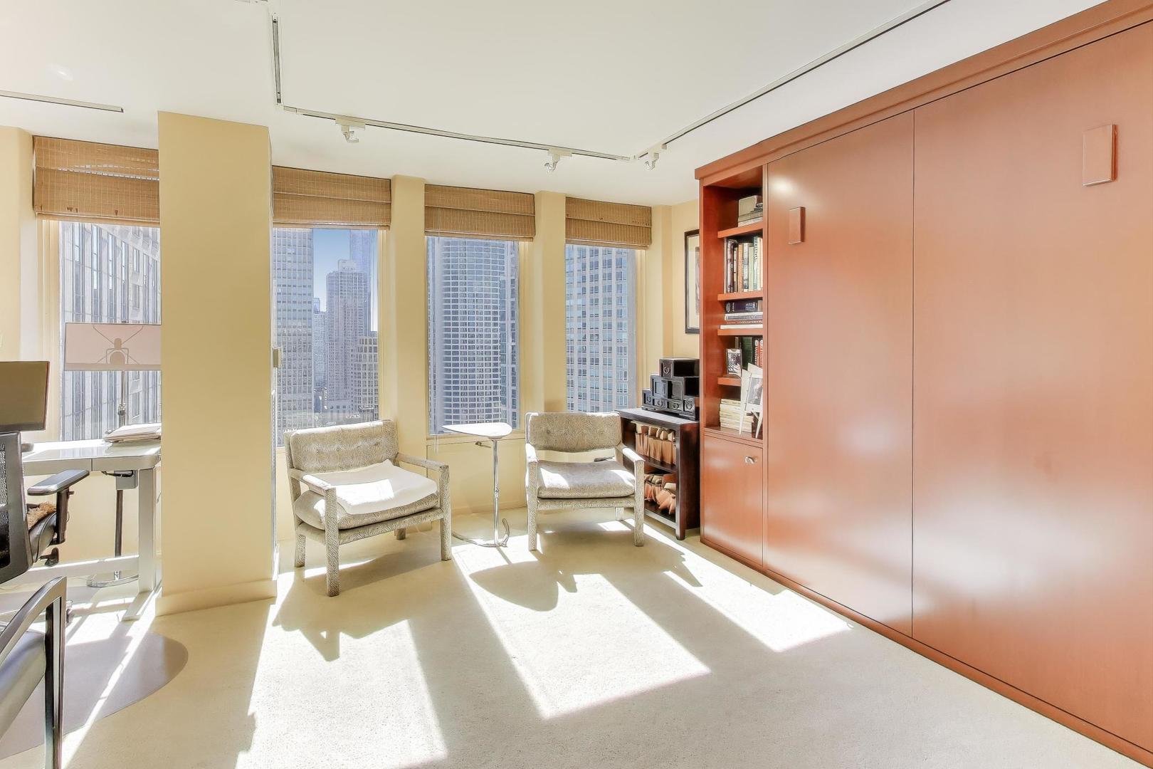 100 East Walton Street, Unit 42F Chicago, IL 60611 - Photo 35 of 50 a living room with furniture and large windows