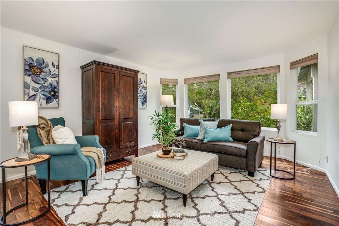 527 224 Place Southeast Bothell, WA 98021 - Photo 2 of 23 a living room with furniture and a large window