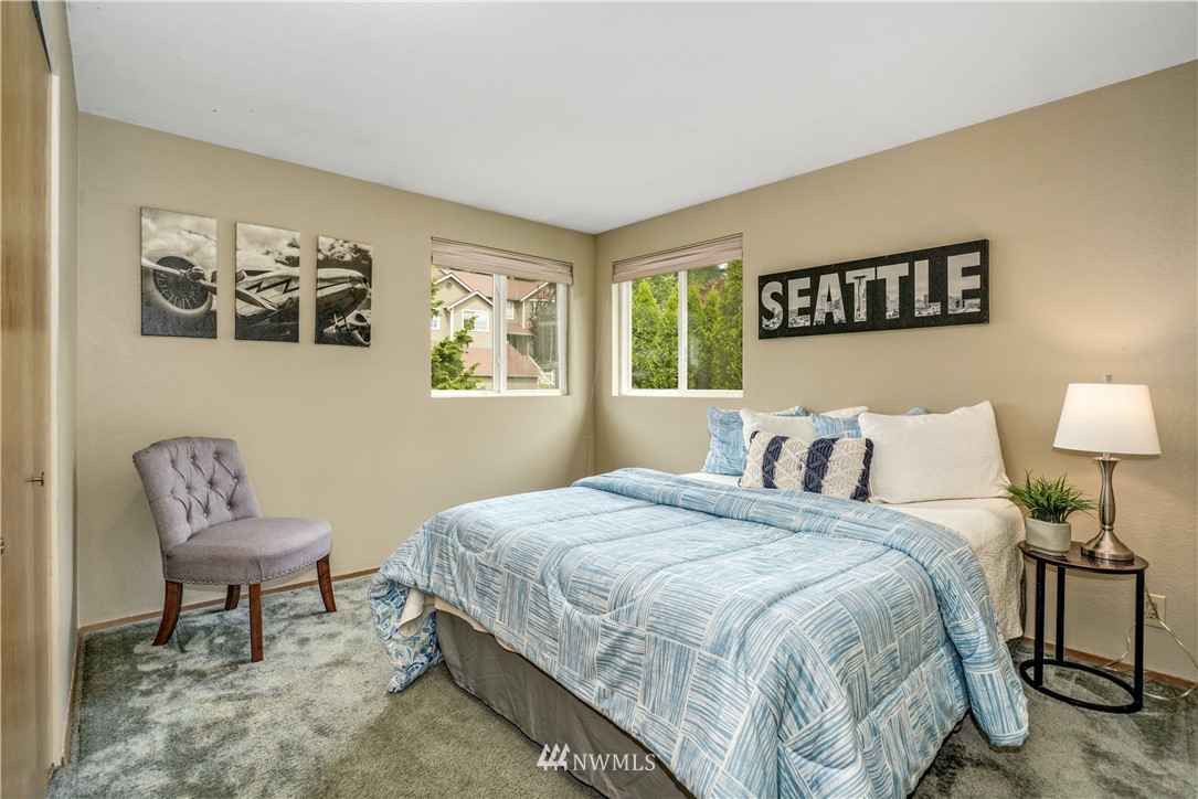 527 224 Place Southeast Bothell, WA 98021 - Photo 15 of 23 a bedroom with a bed and a chair