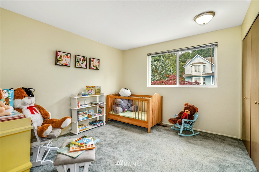 527 224 Place Southeast Bothell, WA 98021 - Photo 16 of 23 a bedroom with furniture and a window