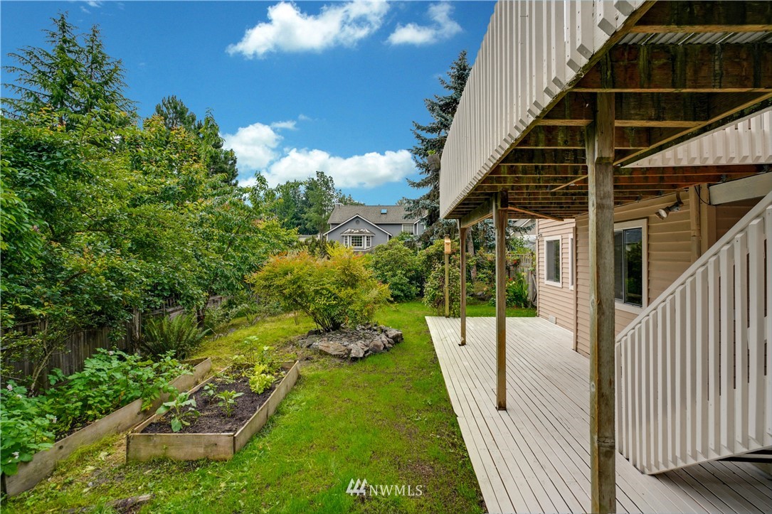 527 224 Place Southeast Bothell, WA 98021 - Photo 20 of 23 a view of a backyard with pathway