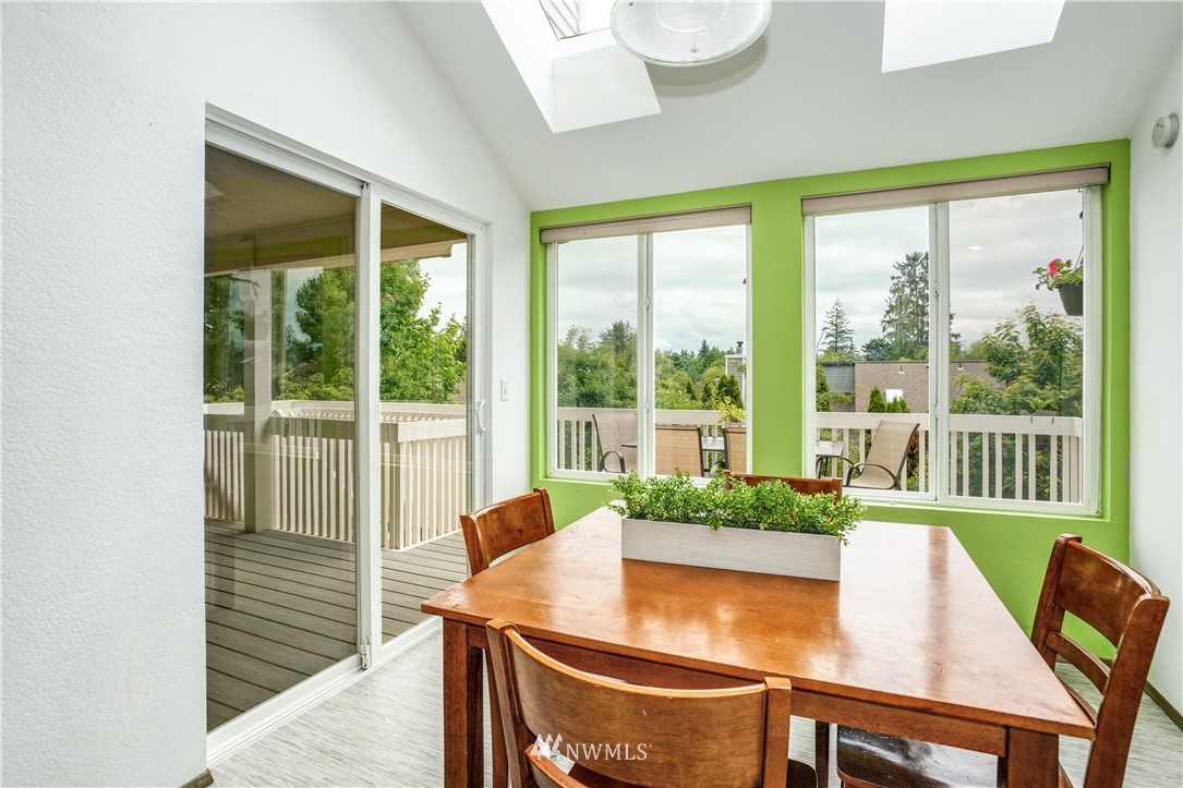 527 224 Place Southeast Bothell, WA 98021 - Photo 7 of 23 a view of a dining room with furniture window and outside view