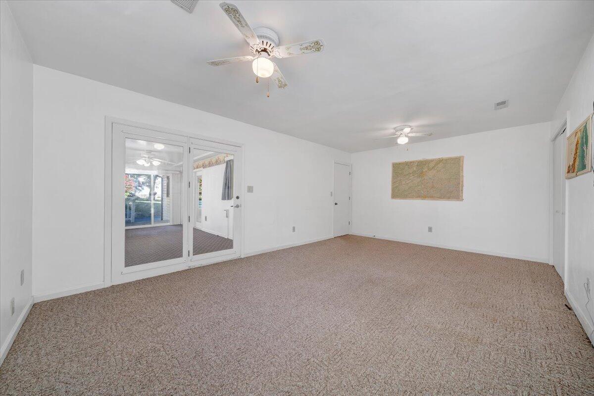 1900 Kiska Road Salem, VA 24153 - Photo 16 of 43 wooden floor in an empty room with a window