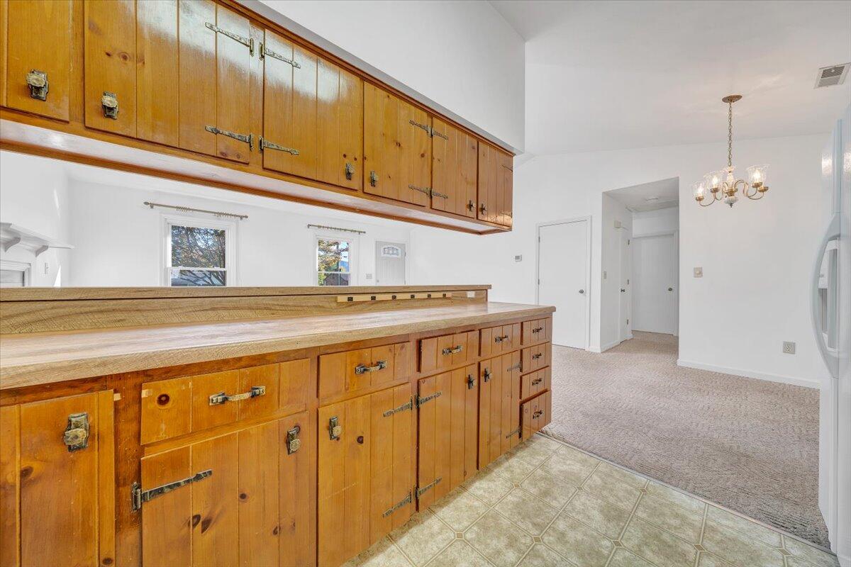 1900 Kiska Road Salem, VA 24153 - Photo 10 of 43 a kitchen with granite countertop a sink cabinets and stainless steel appliances