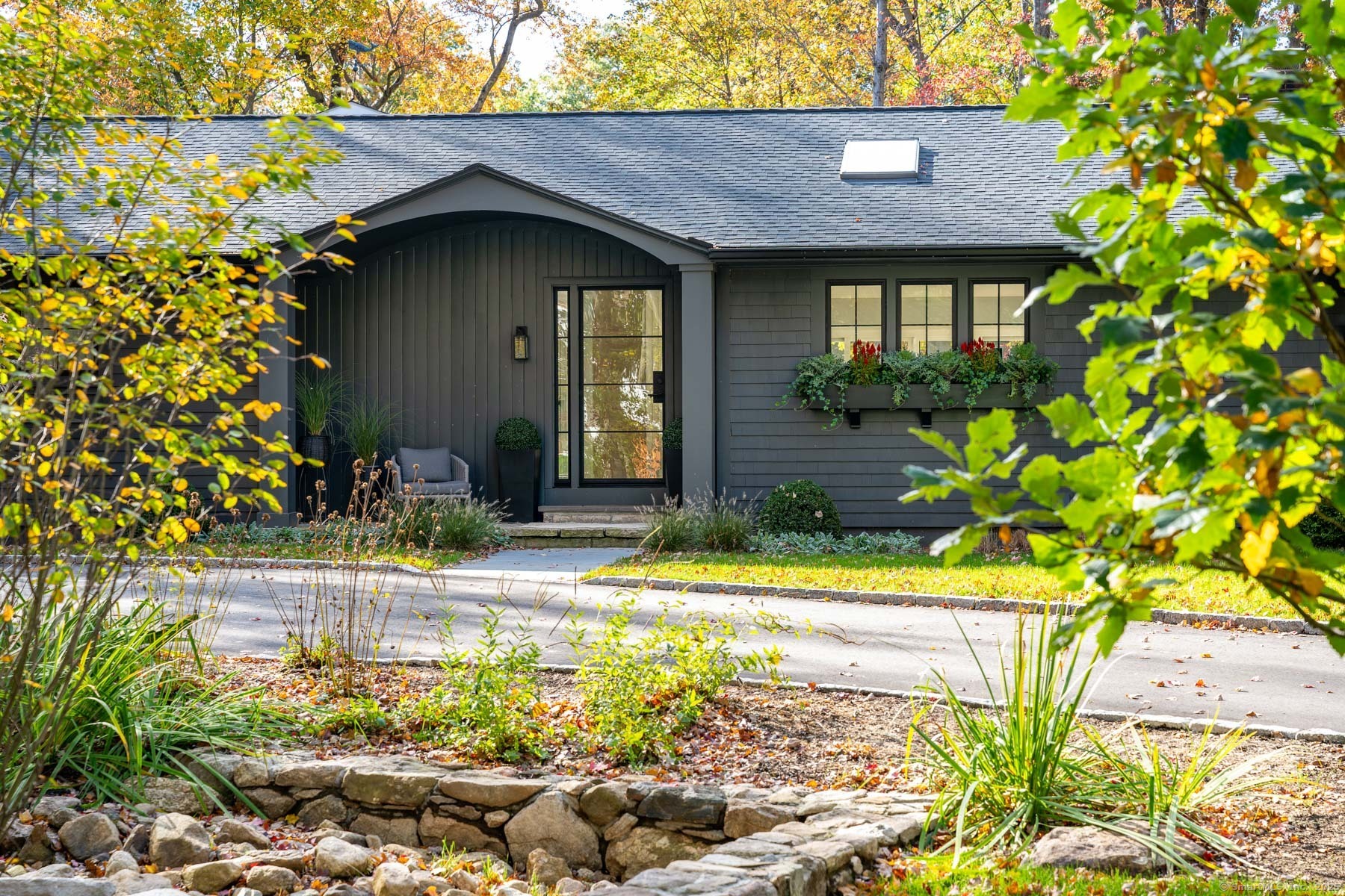 a house view with a garden space
