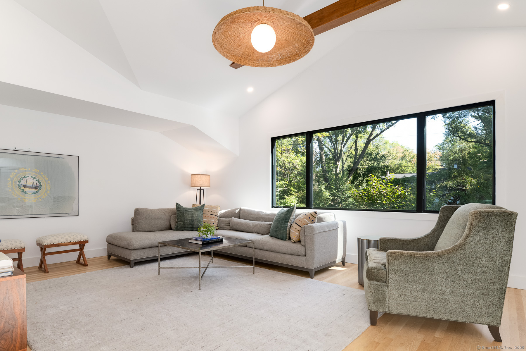 12 Libby Lane Darien, CT 06820 - Photo 11 of 36 a living room with furniture and a large window
