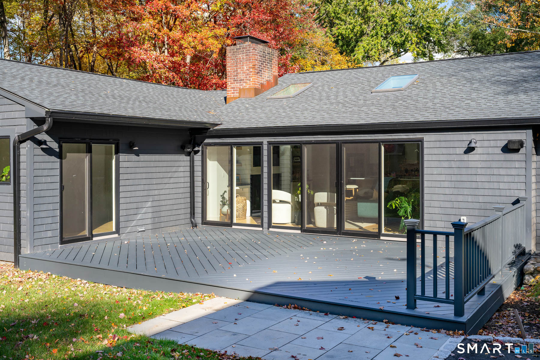 12 Libby Lane Darien, CT 06820 - Photo 26 of 36 a view of house with porch and wooden floor