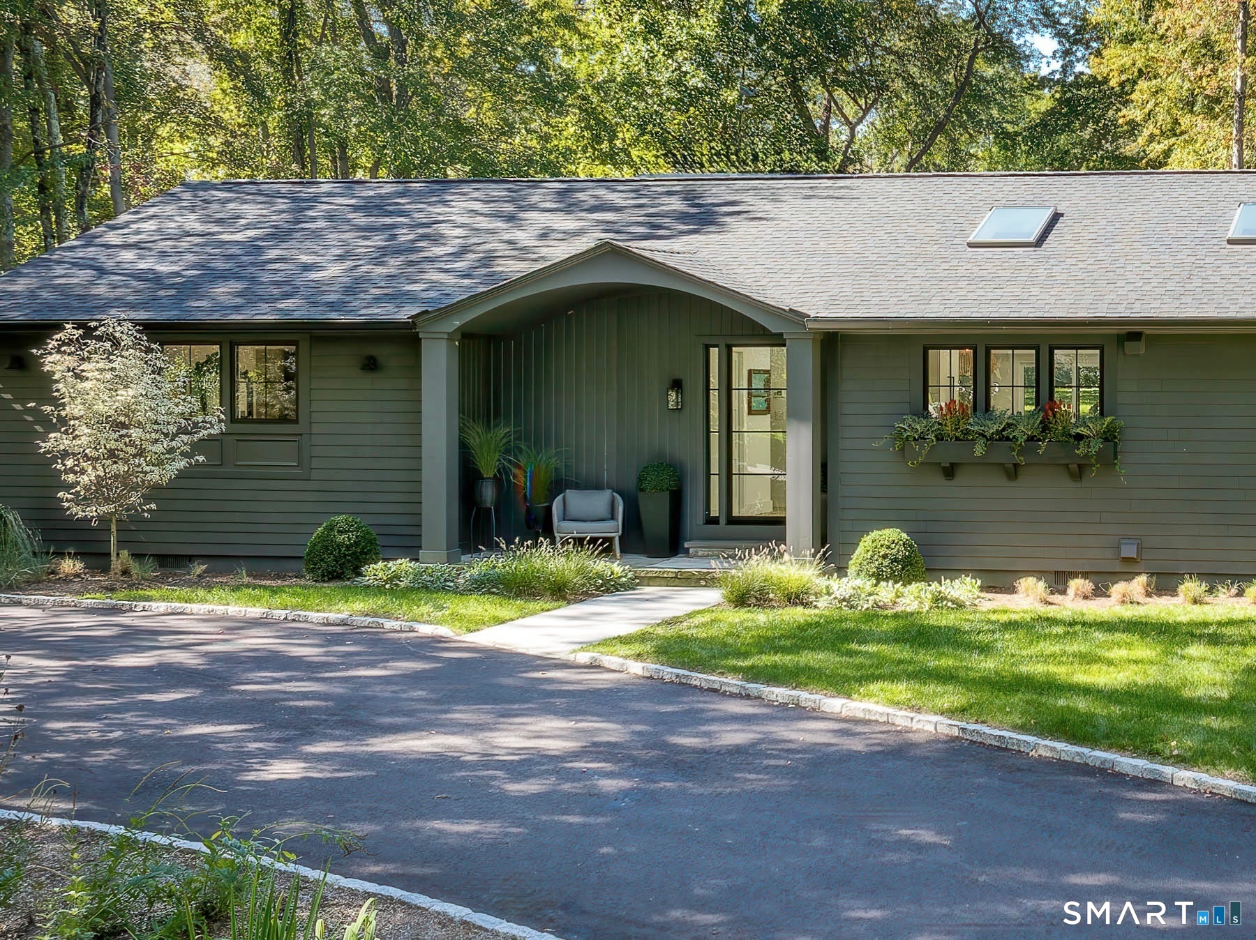 12 Libby Lane Darien, CT 06820 - Photo 31 of 36 a view of a house with a yard