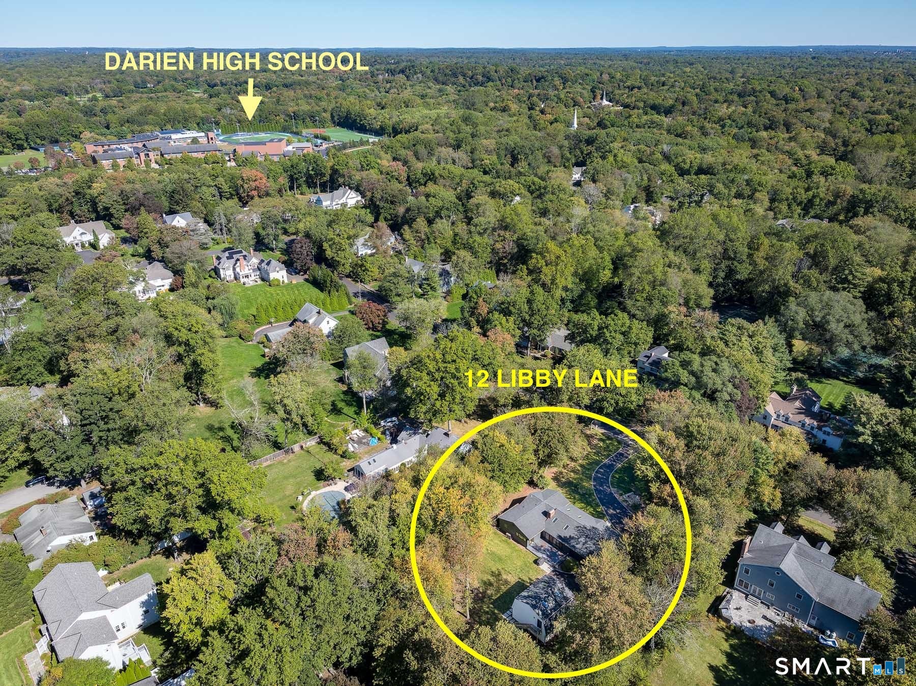 12 Libby Lane Darien, CT 06820 - Photo 34 of 36 an aerial view of a house with a yard and lake view