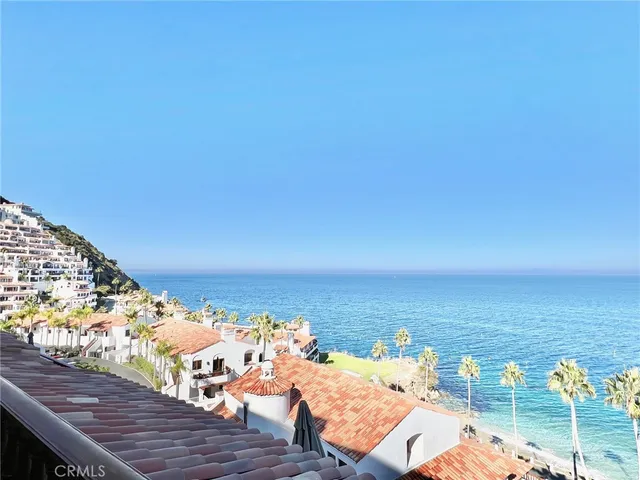 a view of a balcony with an ocean view