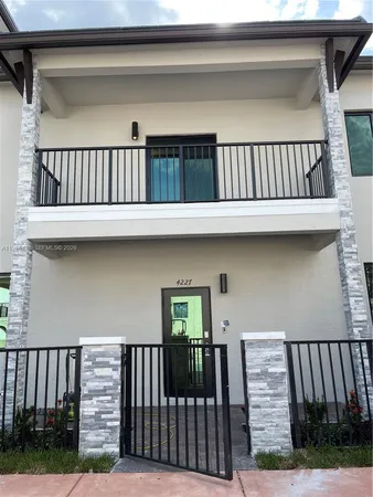 a view of outdoor space with deck and furniture