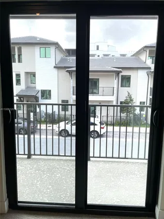 a view of a large window with an outdoor space