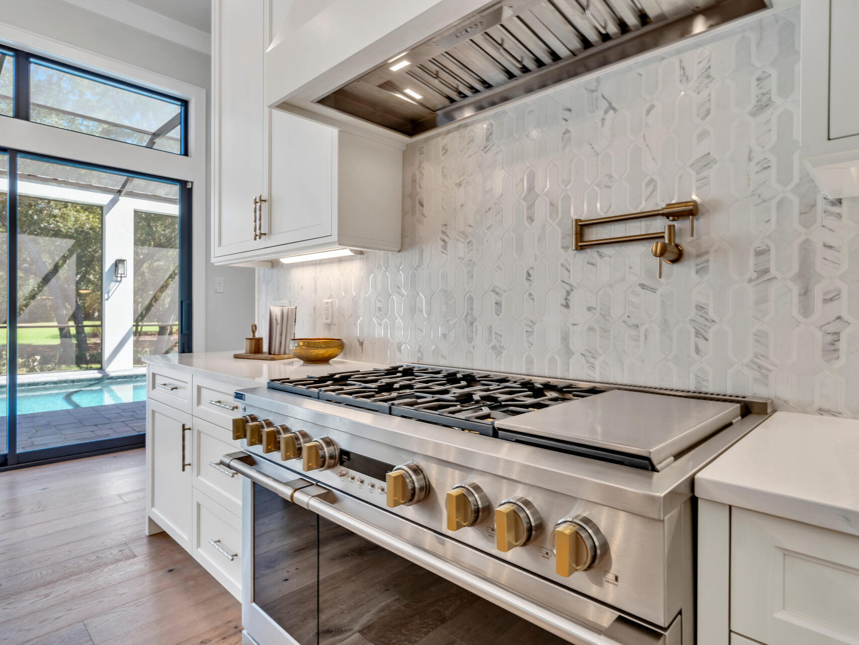 3526 Burnt Pine Lane Miramar Beach, FL 32550 - Photo 15 of 49 a stove top oven sitting inside of a kitchen
