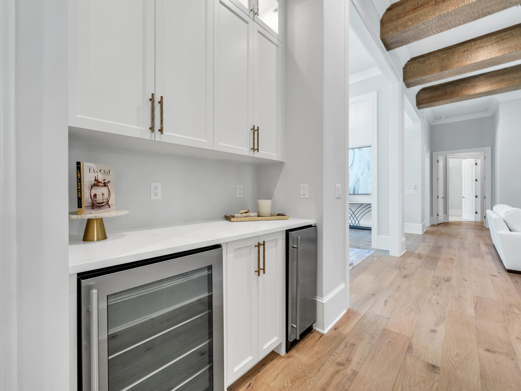 3526 Burnt Pine Lane Miramar Beach, FL 32550 - Photo 17 of 49 a kitchen with a sink cabinets and a wooden floor