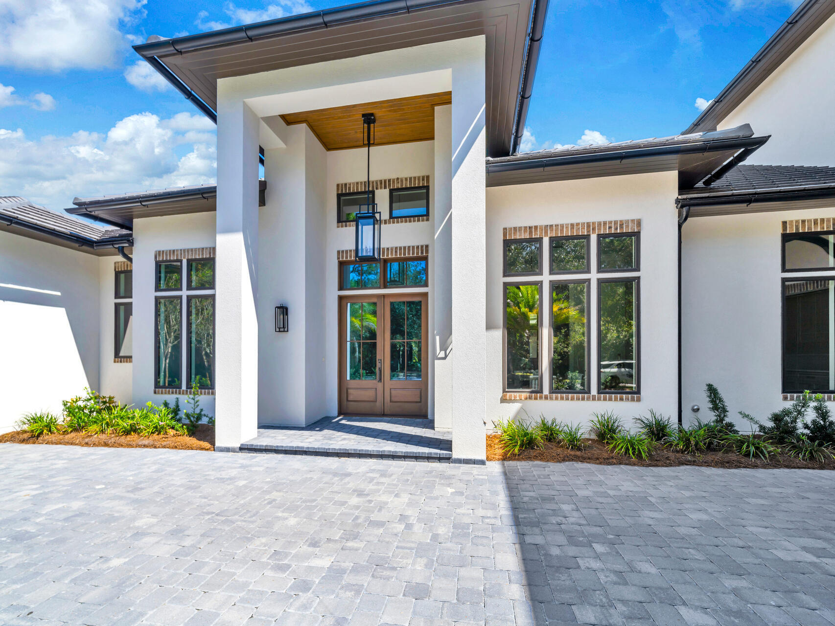 3526 Burnt Pine Lane Miramar Beach, FL 32550 - Photo 2 of 49 a view of a brick house with potted plants