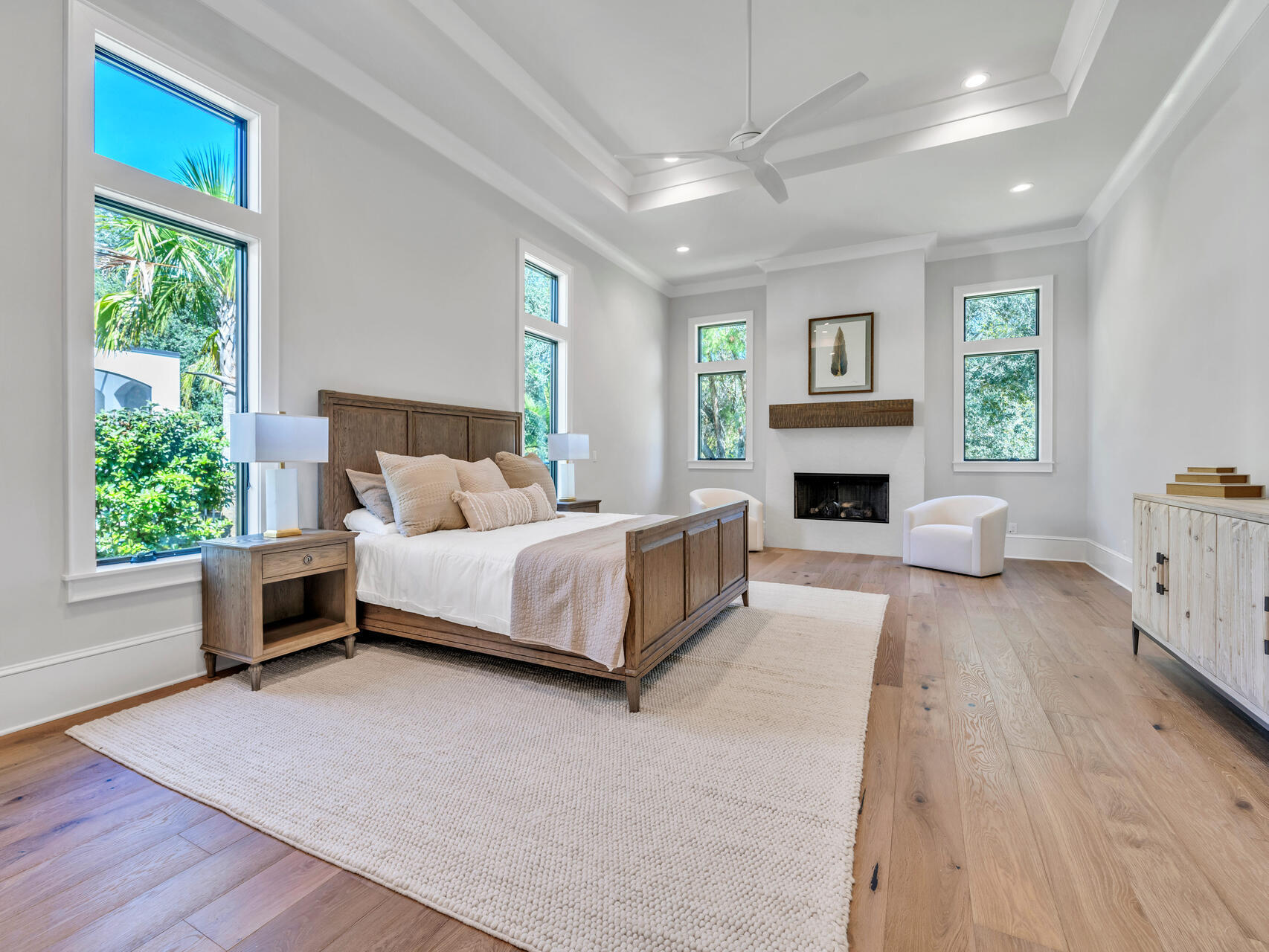 3526 Burnt Pine Lane Miramar Beach, FL 32550 - Photo 26 of 49 a spacious bedroom with a large bed and a fireplace