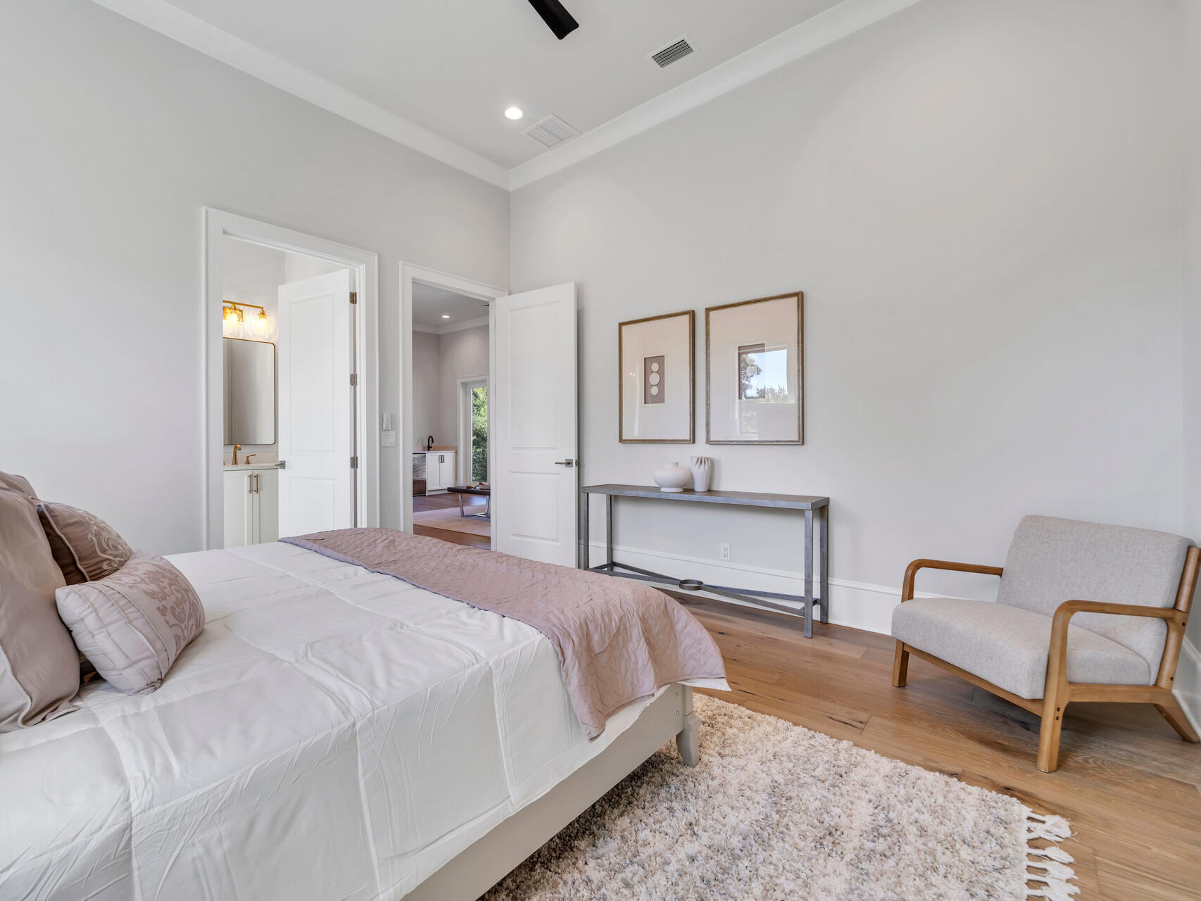 3526 Burnt Pine Lane Miramar Beach, FL 32550 - Photo 39 of 49 a spacious bedroom with a bed and a chair