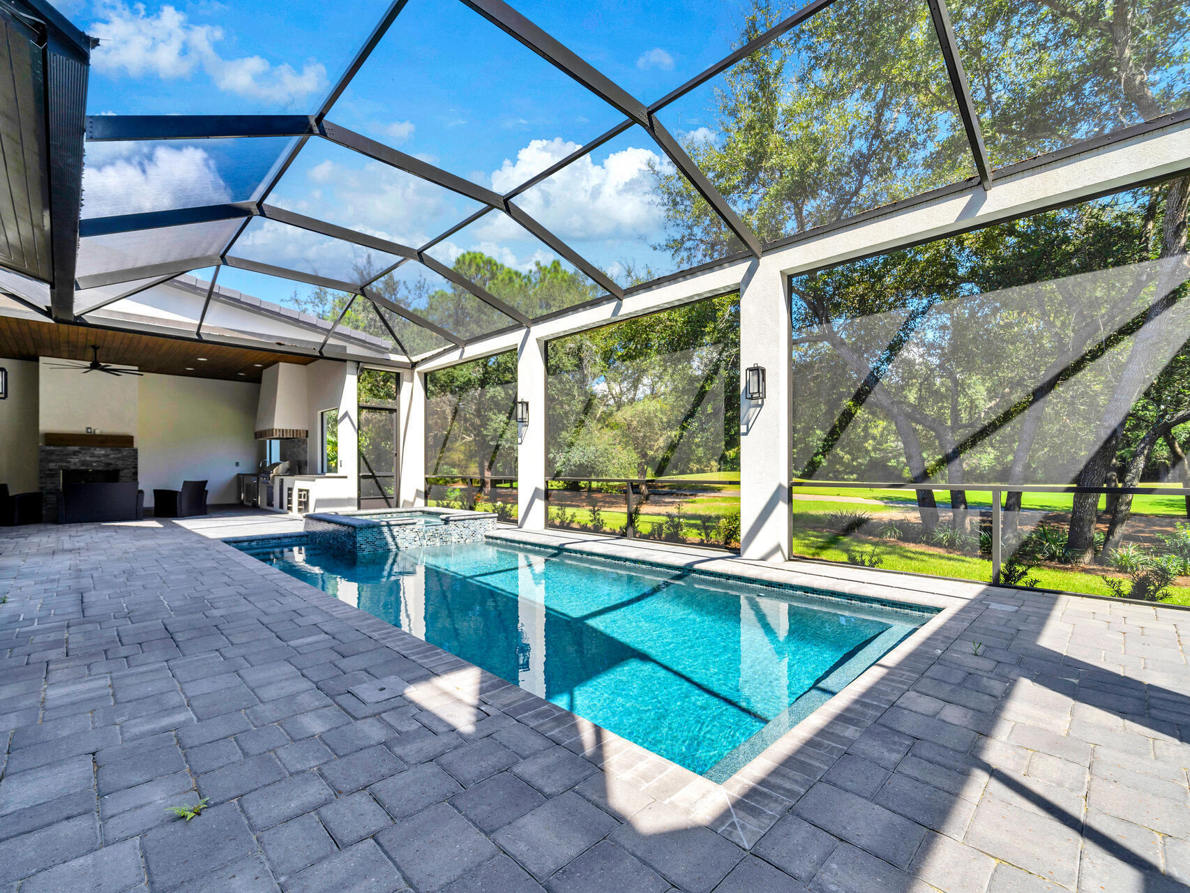 3526 Burnt Pine Lane Miramar Beach, FL 32550 - Photo 44 of 49 a view of a swimming pool with a patio and a yard