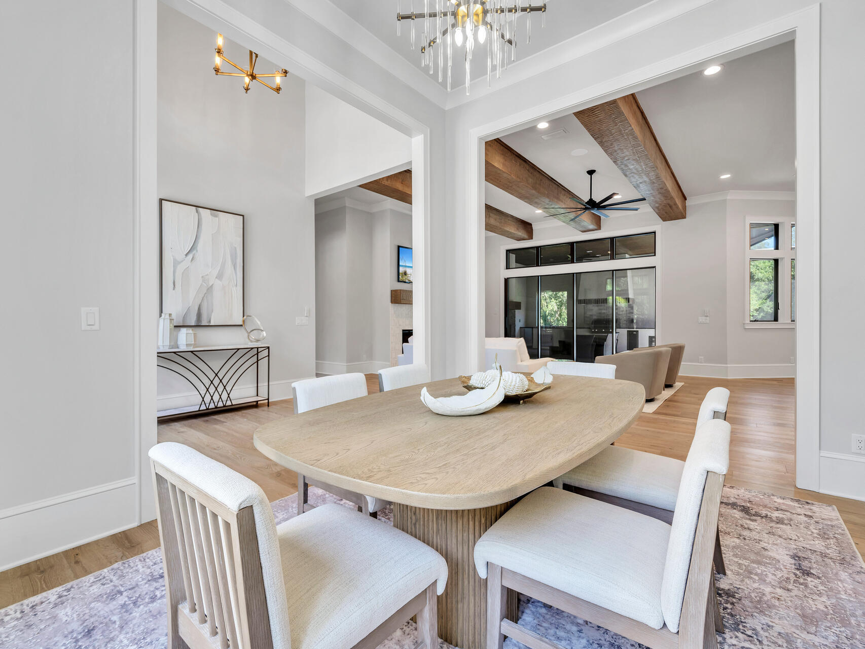 3526 Burnt Pine Lane Miramar Beach, FL 32550 - Photo 5 of 49 a view of a dining room with furniture and wooden floor