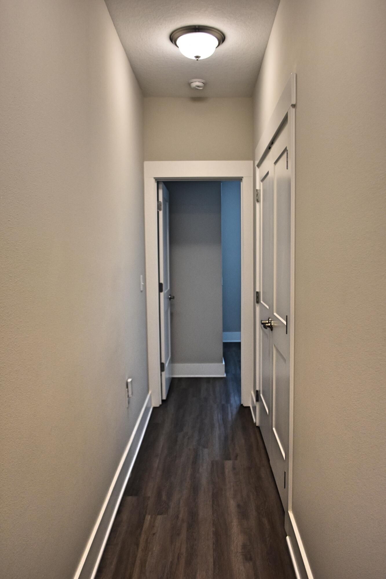242 North Sand Palm Road Freeport, FL 32439 - Photo 13 of 34 wooden floor in an empty room