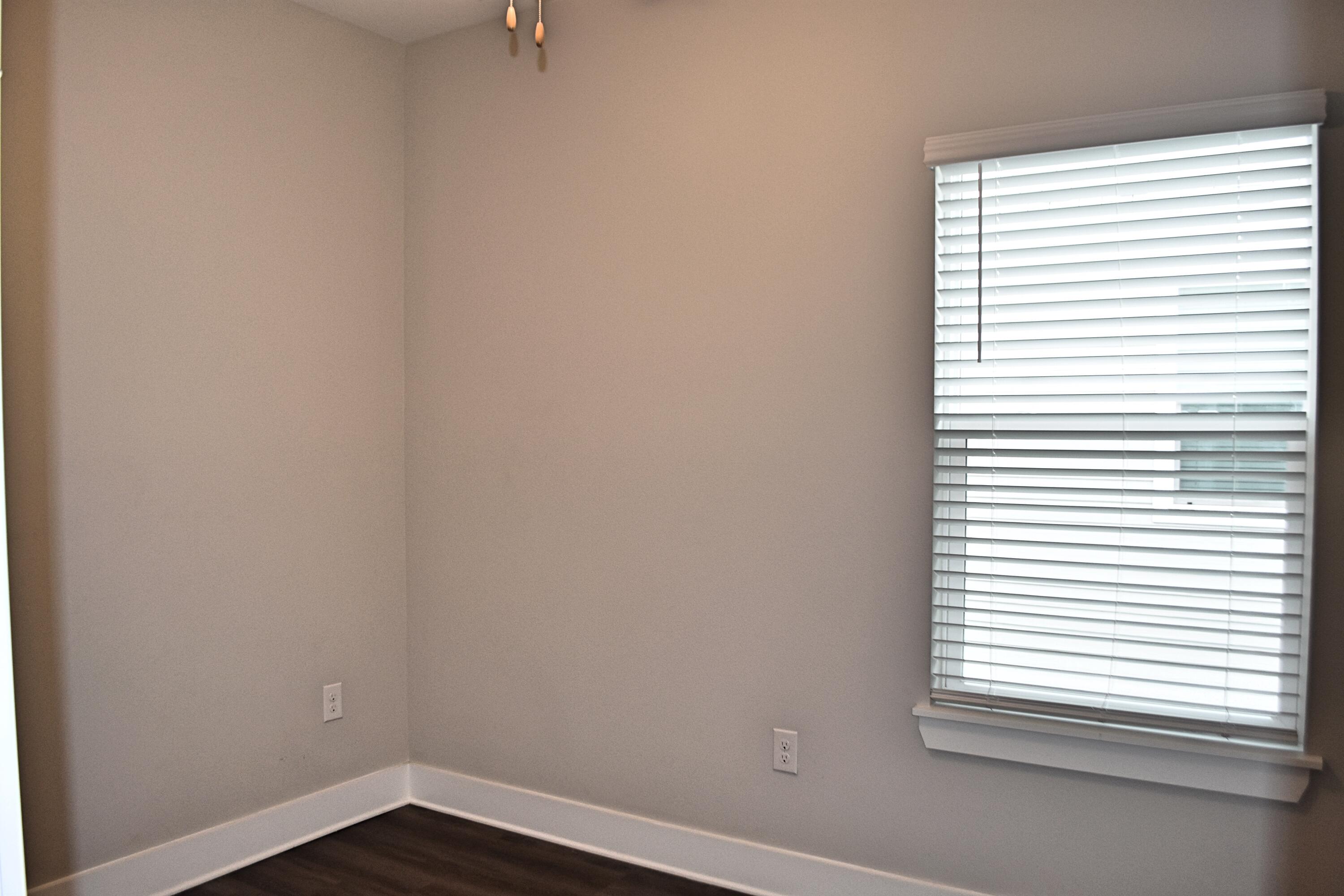 242 North Sand Palm Road Freeport, FL 32439 - Photo 23 of 34 an empty room with a window