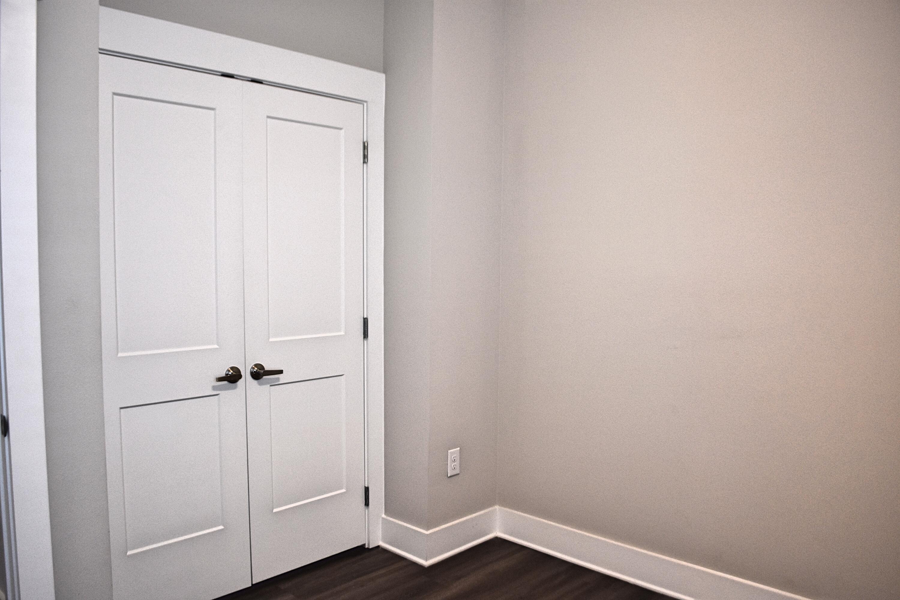 242 North Sand Palm Road Freeport, FL 32439 - Photo 24 of 34 an empty room with wooden floor