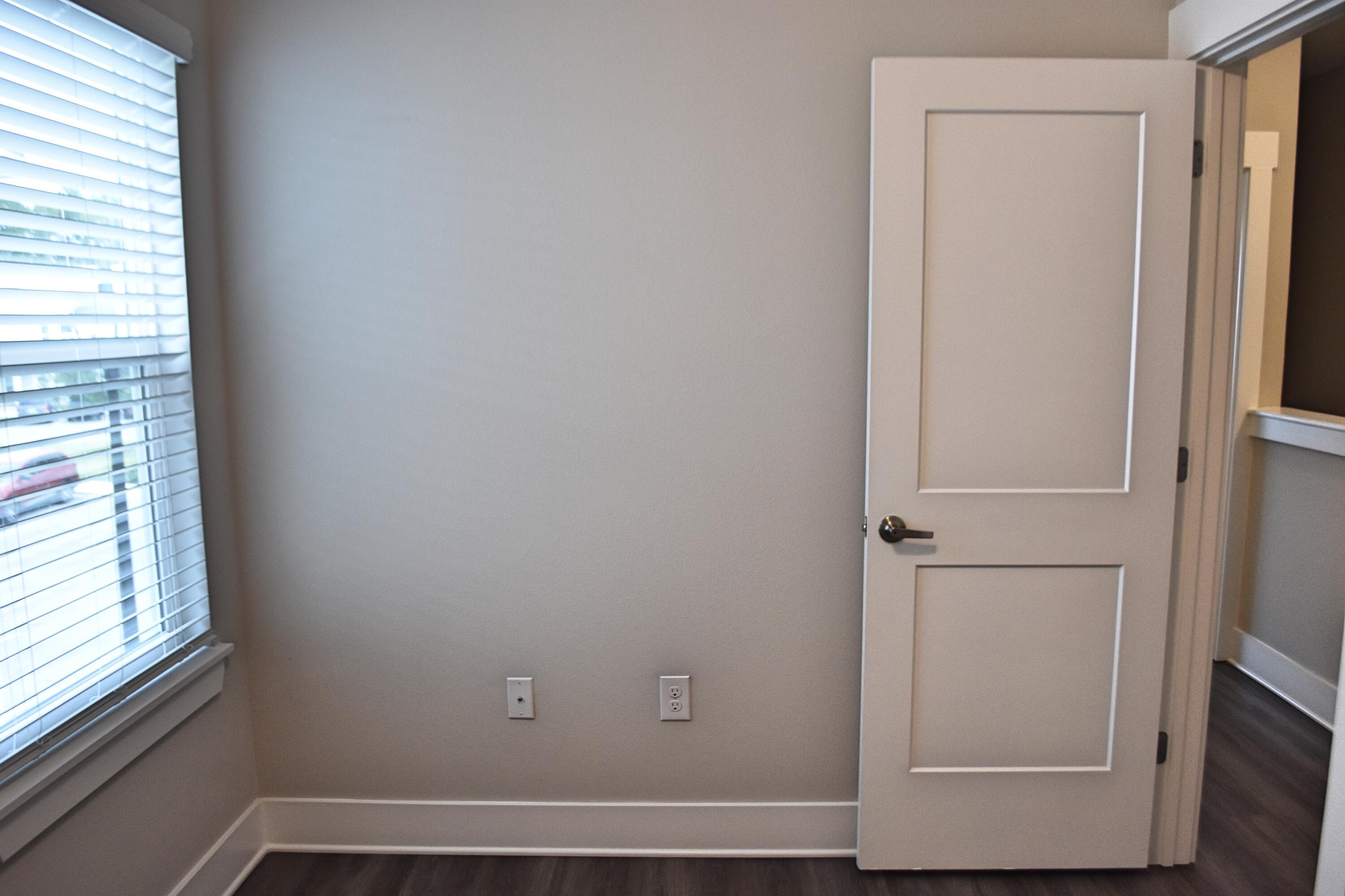 242 North Sand Palm Road Freeport, FL 32439 - Photo 26 of 34 a view of front door with a chair