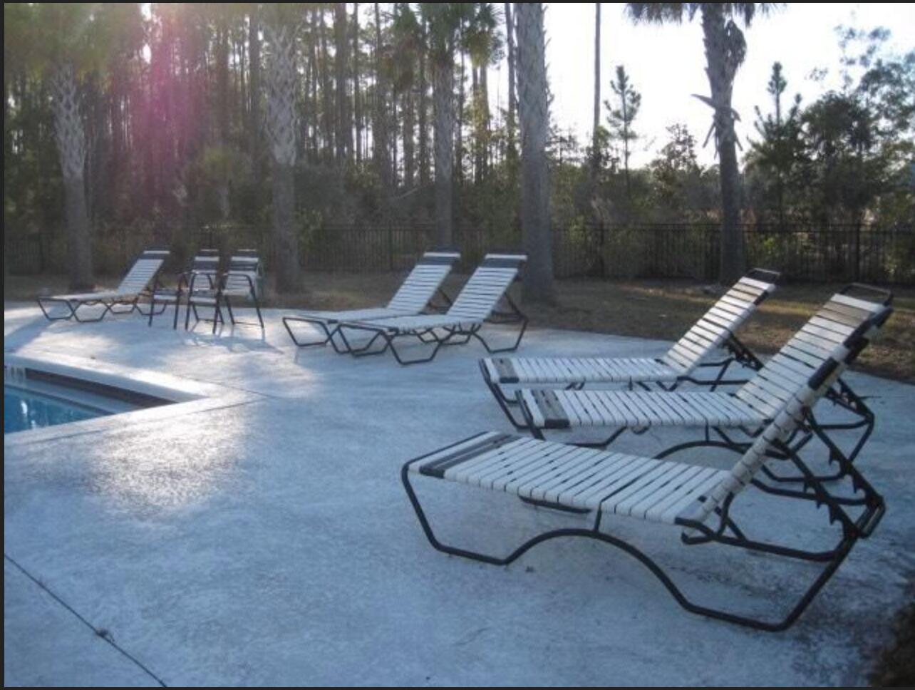 242 North Sand Palm Road Freeport, FL 32439 - Photo 33 of 34 a view of a couches in a patio