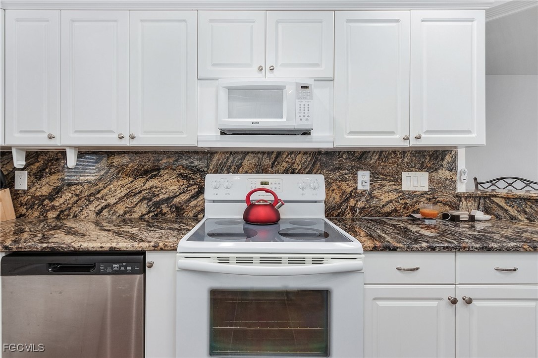 1120 Southeast 46th Street, Unit 2B Cape Coral, FL 33904 - Photo 13 of 26 a stove top oven sitting inside of a kitchen