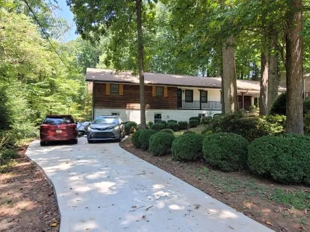 a house view with a garden space